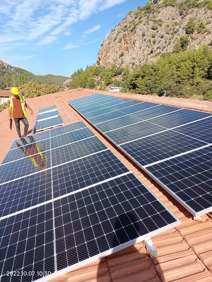 Solar panel arrays on the tiled roof